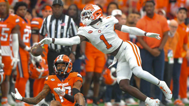 Clemson safety Andrew Mukuba (1) breaks up a pass to Syracuse receiver Umari Hatcher (17) during the second quarter Sep 30, 2