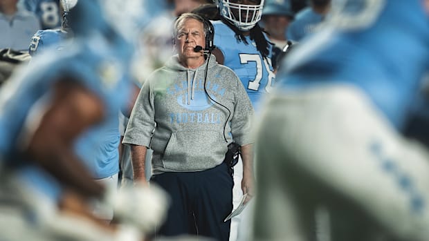 Bill Belichick looks on from the sidelines.