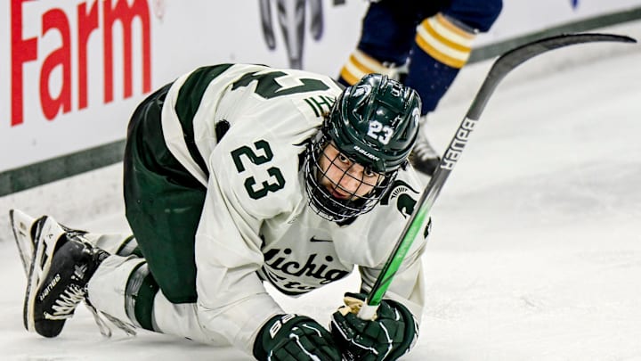 Michigan State's Shane Vansaghi gets up off the ice after falling against Notre Dame during the second period in the Big Ten tournament on Saturday, March 15, 2025, at Muni Arena in East Lansing.