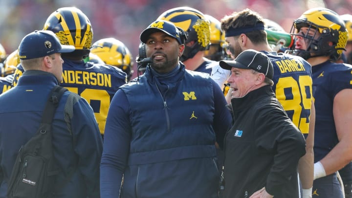 Michigan acting head coach Sherrone Moore watches a replay during the first half against Ohio State at Michigan Stadium in Ann Arbor on Saturday, Nov. 25, 2023.