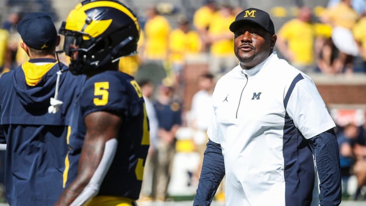 Michigan wide receivers coach Ron Bellamy watches warm up before the East Carolina game at Michigan Stadium in Ann Arbor, Saturday, Sept. 2, 2023.