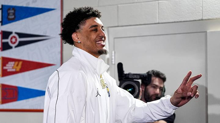 Michigan forward Yaxel Lendeborg (23) walks towards the locker room as the team arrive for the national championship game at Lucas Oil Stadium in Indianapolis on Monday, April 6, 2026.