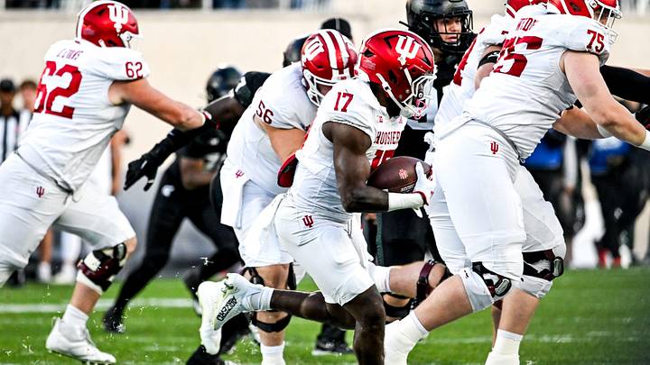 Indiana's Ty Son Lawton runs for a gain against Michigan State during the third quarter on Saturday, Nov. 2, 2024, at Spartan Stadium in East Lansing.