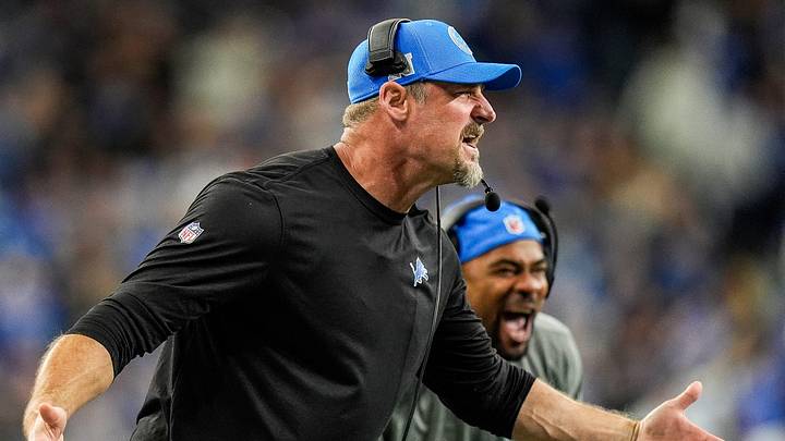 Detroit Lions head coach Dan Campbell celebrates a play against Tennessee Titans next to wide receivers coach Antwaan Randle El during the first half at Ford Field in Detroit on Sunday, Oct. 27, 2024.