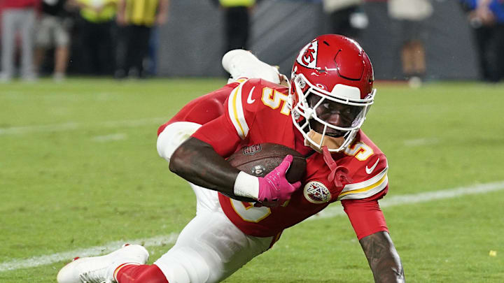 Oct 12, 2025; Kansas City, Missouri, USA; Kansas City Chiefs wide receiver Marquise Brown (5) makes a touchdown catch against the Detroit Lions during the second half at GEHA Field at Arrowhead Stadium. Mandatory Credit: Denny Medley-Imagn Images