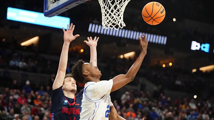 Mar 21, 2024; Omaha, NE, USA; Brigham Young Cougars guard Jaxson Robinson (2) shoots against Duquesne in the first round of the NCAA Tournament.