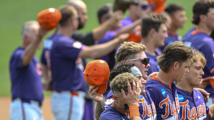 Clemson outfielder Cam Cannarella (10) holds his head during the alma mater song, after the NCAA baseball Clemson Regional at Doug Kingsmore Stadium in Clemson, S.C. Sunday, June 1, 2025. Kentucky won 16-4, ending Clemson's season.