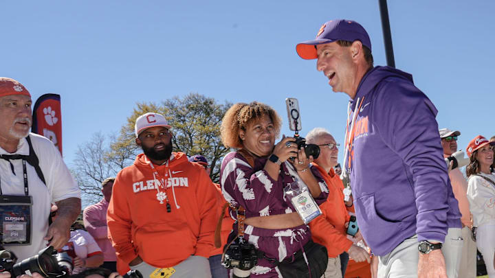 Clemson head coach Dabo Swinney waves to fans and greets them at Tiger Walk before the annnual Clemson Orange and White spring game at Memorial Stadium in Clemson, South Carolina Saturday, March 28, 2026.