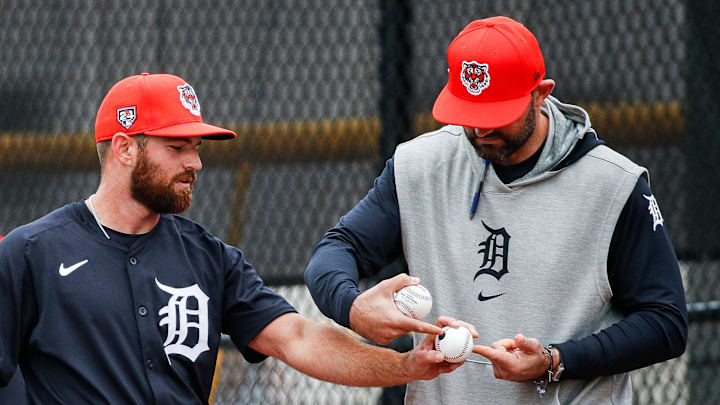 Detroit Tigers director of pitching Gabe Ribas talks to pitcher Sean Guenther during spring training at TigerTown in Lakeland, Fla. on Saturday, Feb. 17, 2024.