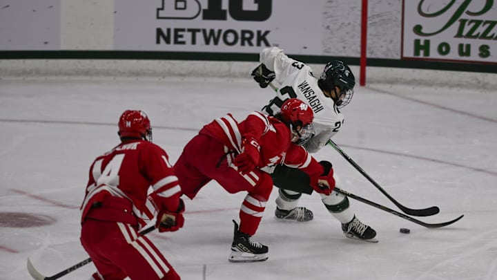 MSU's Shane Vansaghi moves the puck against Wisconsin, Thursday, Jan. 2, 2024, at Munn Ice Arena. MSU won 4-3.