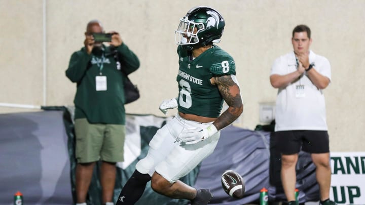 Michigan State running back Jalen Berger (8) scores a touchdown against Central Michigan during the second half at Spartan Stadium in East Lansing on Friday, Sept. 1, 2023.