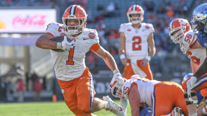 Clemson running back Will Shipley (1) runs during the fourth quarter of the TaxSlayer Gator Bowl at EverBank Stadium in Jacksonville, Florida, Friday, December 29, 2023. Clemson won 38-35.