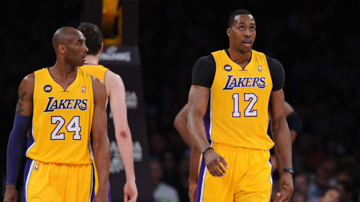 Mar 22, 2013; Los Angeles, CA, USA;  Los Angeles Lakers shooting guard Kobe Bryant (24) and center Dwight Howard (12)  in the first half of the game against the Washington Wizards at the Staples Center. Mandatory Credit: Jayne Kamin-Oncea-USA TODAY Sports