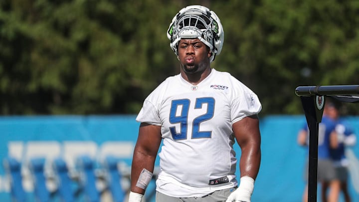 Detroit Lions defensive tackle Chris Smith walks off the field after practice during training camp at the Detroit Lions Headquarters and Training Facility in Allen Park on Sunday, July 23, 2023. Detroit Lions defensive tackle Chris Smith walks off the field after practice during training camp at the Detroit Lions Headquarters and Training Facility in Allen Park on Sunday, July 23, 2023.