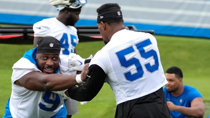 Detroit Lions defensive players Levi Onwuzurike and Derrick Barnes.