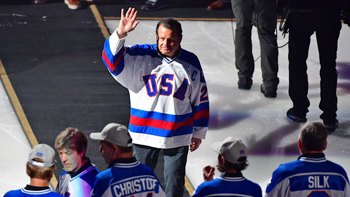 Feb 22, 2020; Las Vegas, Nevada, USA; Captain of the 1980 USA hockey team Mike Eurozine is introduced with the rest of the team as the 40th anniversary of the "Miracle on Ice" is celebrated before a game between the Vegas Golden Knights and the Florida Panthers at T-Mobile Arena. Mandatory Credit: Stephen R. Sylvanie-Imagn Images