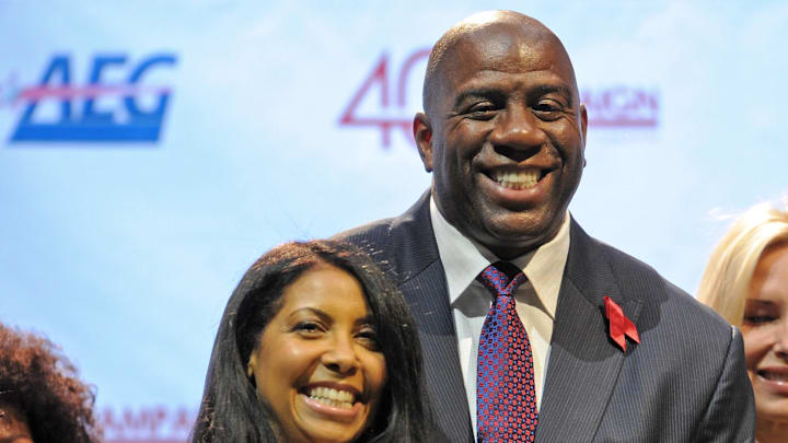 Nov. 7 , 2011; Los Angeles, CA, USA;  Magic Johnson (right) and his wife Cookie Johnson (left) during the press conference held by the Magic Johnson foundation at the Staples Center. 20 years to the date Irvin "Magic" Johnson  announced his HIV status and retirement from the NBA. Mandatory Credit: Jayne Kamin-Oncea-Imagn Images