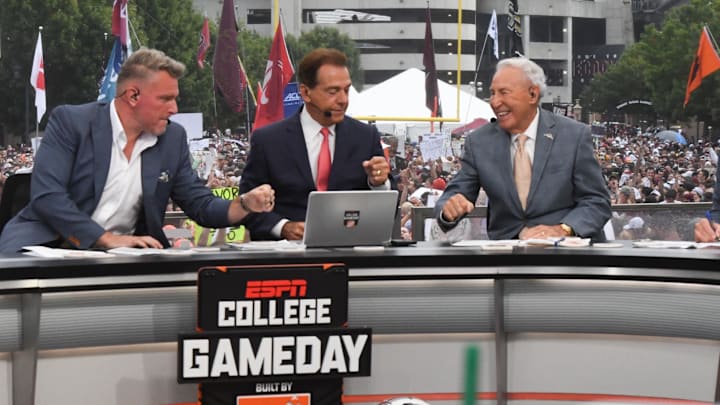 Pat McAfee Nick Saban, and Lee Corso fist bump before live broadcast during ESPN Gameday near Williams-Brice Stadium in Columbia, S.C.Saturday, September 14, 2024.