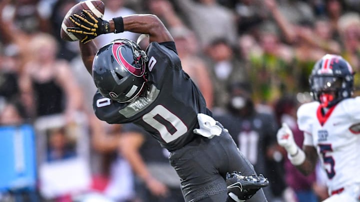 Westside High senior Dreson Evans (0) catches a pass near Belton-Honea Path High sophomore Tajeh Watson-Martin (5) during the first quarter at Westside High in Anderson, S.C. Friday, September 13, 2024.