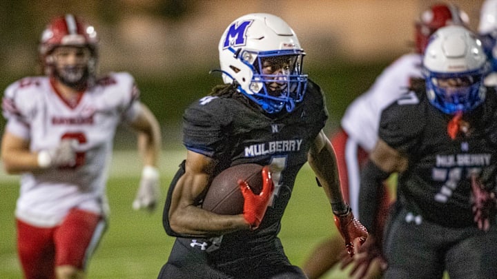 Mulberry (4) Traveon Hymes scrambles for yardage through the Kathleen defense in first half action Friday August 30 2024, in Mulberry Fl. Ernst Peters/The Ledger