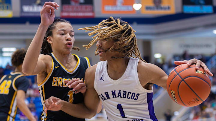 San Marcos Rattlers guard Jayven Cofer (right) tries to dribble into the lane as Brennan Bears guard Kingston Flemings defends during the first period at the Class 6A Regional Finals for Boys basketball playoff on Saturday, Mar 4, 2023, at Northside Sports Gym in San Antonio, Texas. Flemings committed to Houston on Thursday San Marcos Rattlers guard Jayven Cofer (right) tries to dribble into the lane as Brennan Bears guard Kingston Flemings defends during the first period at the Class 6A Regional Finals for Boys basketball playoff on Saturday, Mar 4, 2023, at Northside Sports Gym in San Antonio, Texas. Flemings committed to Houston on Thursday
