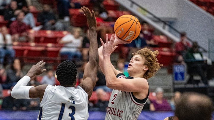 Santa Fe Catholic (2) Tate Darner goes up for the shot against University Christian (3) Marvin Christie and (13) Augustine Ayelyiney during the FHSAA 2A Boys State semifinal game at the RP Funding Center Thursday February 27, 2025 in Lakeland Fl. Santa Fe advances to the state final 71-50.
Ernst Peters/The Ledger Santa Fe Catholic (2) Tate Darner goes up for the shot against University Christian (3) Marvin Christie and (13) Augustine Ayelyiney during the FHSAA 2A Boys State semifinal game at the RP Funding Center Thursday February 27, 2025 in Lakeland Fl. Santa Fe advances to the state final 71-50.
Ernst Peters/The Ledger