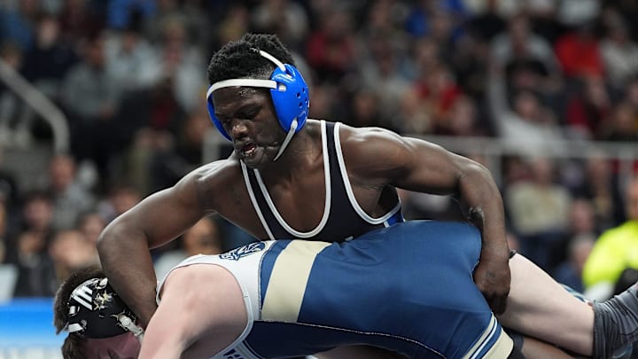 Dunia Sibomana-Rodriguez from Long Beach wrestles Cooper Merli from Newburgh Free Academy in the 116-pound Division I championship match at the NYSPHSAA Boys Wrestling Championships at MVP Arena in Albany on Saturday, March 1, 2025. Dunia Sibomana-Rodriguez from Long Beach wrestles Cooper Merli from Newburgh Free Academy in the 116-pound Division I championship match at the NYSPHSAA Boys Wrestling Championships at MVP Arena in Albany on Saturday, March 1, 2025.