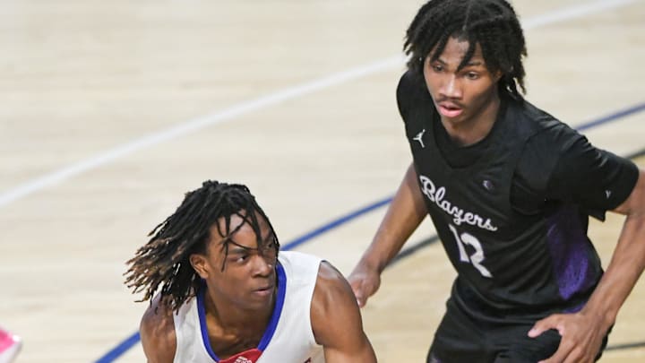 Riverside's Robert Robertson (13) looks to pass near Ridge View High forward Korie Corbett (12) during the first quarter of the 2024 South Carolina High School 4A Basketball Championship game at the Florence Center in Florence, S.C. Saturday, March 2, 2024.