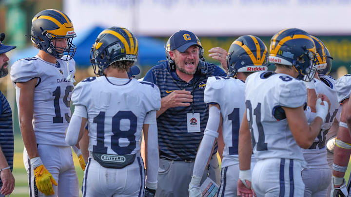 Clarkston head coach Justin Pintar talks to his team during the 2024 Xenith Prep Kickoff Classic at Wayne State's Tom Adams Field in Detroit on Friday, Aug. 30, 2024. Clarkston head coach Justin Pintar talks to his team during the 2024 Xenith Prep Kickoff Classic at Wayne State's Tom Adams Field in Detroit on Friday, Aug. 30, 2024.