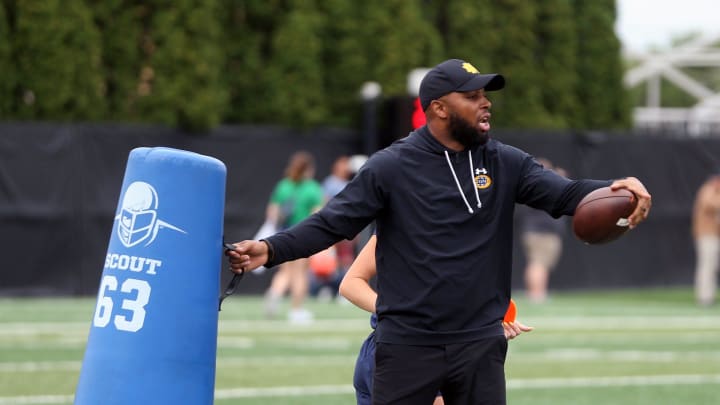 Notre Dame wide receivers coach Mike Brown gives instructions before a drill during a practice Friday, August 2, 2024, at the Irish Athletics Center in South Bend.