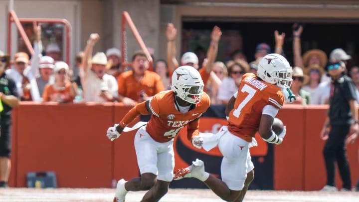 Texas Longhorns defensive back Jahdae Barron (7) runs with the ball after catching an interception as the Texas Longhorns take on Colorado State at Darrell K Royal-Texas Memorial Stadium in Austin Saturday, Aug. 31, 2024.