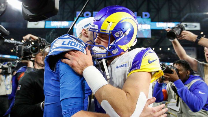 Detroit Lions quarterback Jared Goff hugs Los Angeles Rams quarterback Matthew Stafford after the Lions' 24-23 win in the NFC wild-card game at Ford Field in Detroit on Sunday, Jan, 14, 2024.