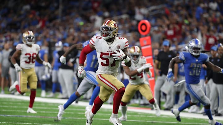 San Francisco 49ers linebacker Dre Greenlaw returns an interception back for a touchdown against the Detroit Lions on Sunday, Sept. 12, 2021 at Ford Field. San Francisco 49ers linebacker Dre Greenlaw returns an interception back for a touchdown against the Detroit Lions on Sunday, Sept. 12, 2021 at Ford Field.
