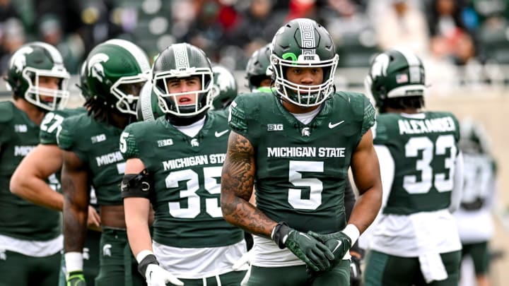 Michigan State's Jordan Hall and the linebackers prepare for a drill during the Spring Showcase on Saturday, April 20, 2024, at Spartan Stadium in East Lansing.