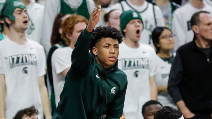 Michigan State guard Jeremy Fears Jr. (1) cheers for teammates from the bench against Northwestern during the first half at Breslin Center in East Lansing on Wednesday, March 6, 2024.