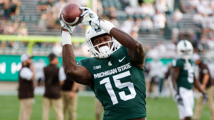 Michigan State wide receiver Jaron Glover makes a catch during warmups before the game against Western Michigan at Spartan Stadium in East Lansing on Friday, Sept. 2, 2022.