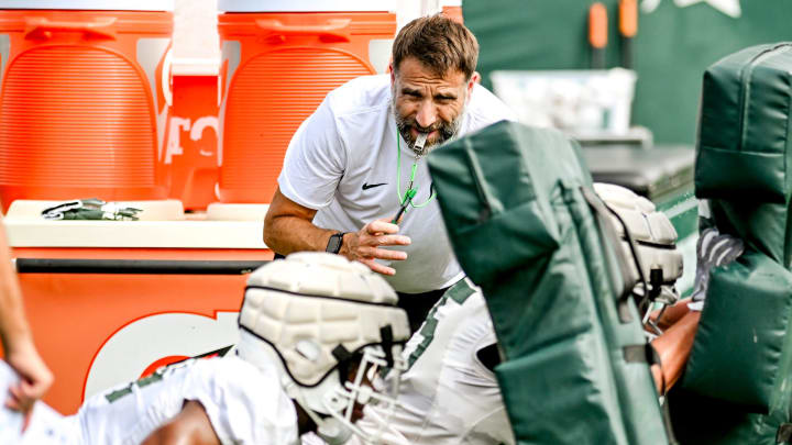 Michigan State's defensive coordinator Joe Rossi looks on while working with the linebackers during the first day of football camp on Tuesday, July 30, 2024, in East Lansing.