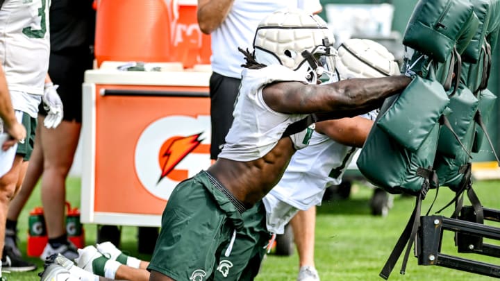 Michigan State's Jordan Turner participates in a drill during the first day of football camp on Tuesday, July 30, 2024, in East Lansing.