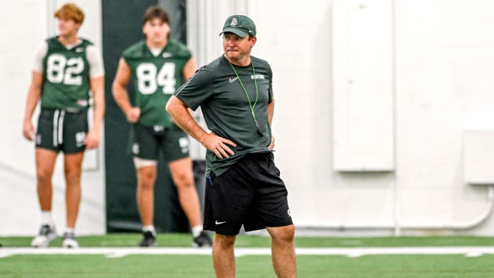 Michigan State's head coach Jonathan Smith looks on during camp on Monday, Aug. 5, 2024, at the indoor practice facility in East Lansing.