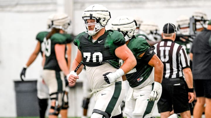 Michigan State's Luke Newman works out during camp on Monday, Aug. 5, 2024, at the indoor practice facility in East Lansing.