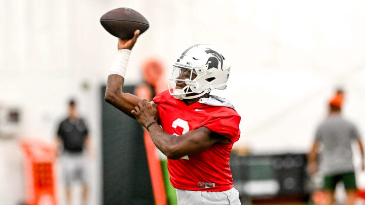 Michigan State's Aidan Chiles throws a pass during camp on Monday, Aug. 5, 2024, at the indoor practice facility in East Lansing.