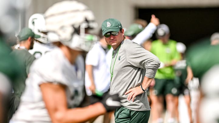 Michigan State's head coach Jonathan Smith looks on during the first day of football camp on Tuesday, July 30, 2024, in East Lansing.