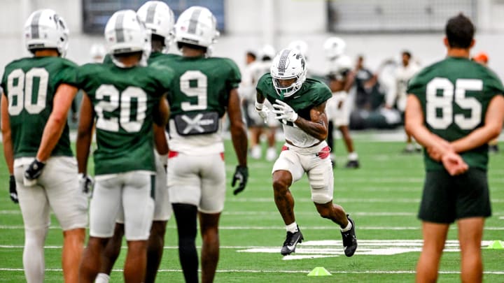 Michigan State's Alante Brown runs a drill during camp on Monday, Aug. 5, 2024, at the indoor practice facility in East Lansing.