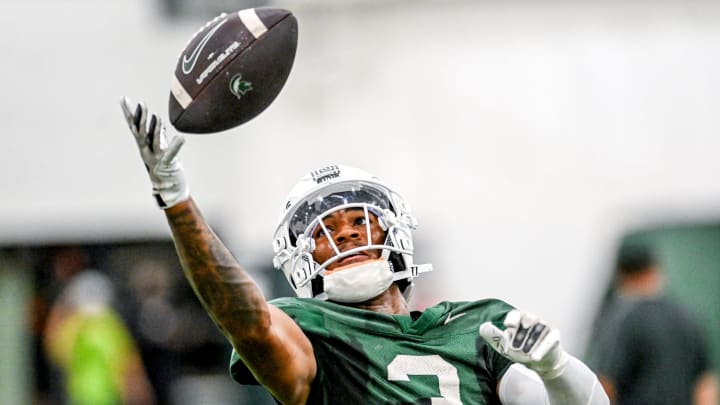 Michigan State's Montorie Foster Jr. catches a pass during camp on Monday, Aug. 5, 2024, at the indoor practice facility in East Lansing.