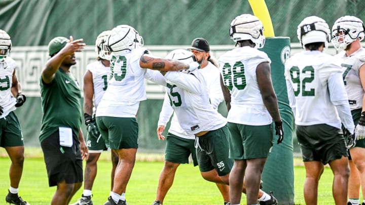 Michigan State's defensive line works out during the first day of football camp on Tuesday, July 30, 2024, in East Lansing.