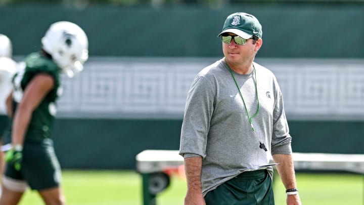 Michigan State's head coach Jonathan Smith watches over the action during the first day of football camp on Tuesday, July 30, 2024, in East Lansing.