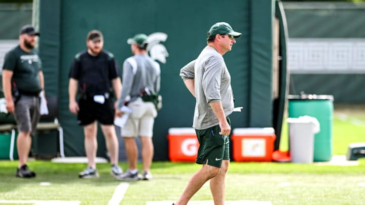 Michigan State's head coach Jonathan Smith watches over the action during the first day of football camp on Tuesday, July 30, 2024, in East Lansing.