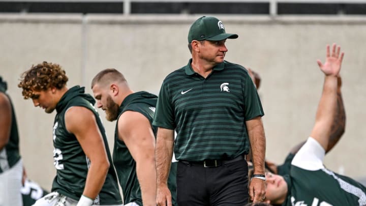 Michigan State's head coach Jonathan Smith looks on during team warm ups before the game against Florida Atlantic on Friday, Aug. 30, 2024, at Spartan Stadium in East Lansing.