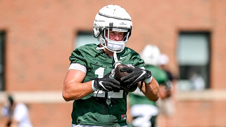 Michigan State's Jack Velling runs after a catch during the first day of football camp on Tuesday, July 30, 2024, in East Lansing.