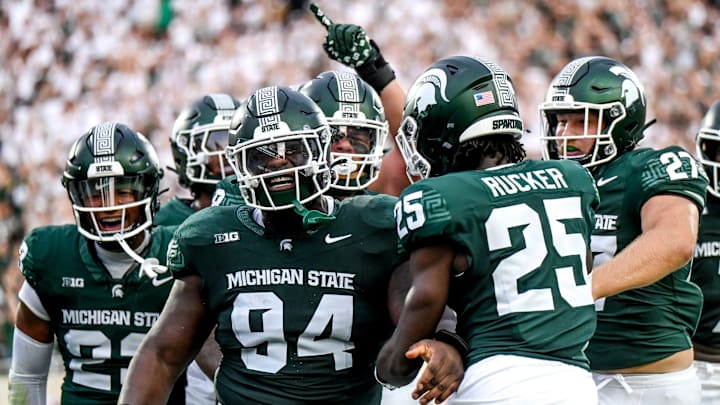 Michigan State's D'Quan Douse, left, celebrates his safety with teammates during the first quarter in the game against Florida Atlantic on Friday, Aug. 30, 2024, at Spartan Stadium in East Lansing.